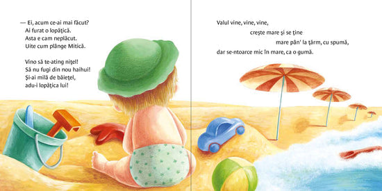 Un cățel pe malul mării